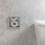 Wnęka ścienna na zapas 6 rolek papieru toaletowego Stal Szlachetna Szczotkowana XtraStoris Original Hansgrohe (56058800)