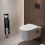 Wnęka ścienna na papier toaletowy z pojemnikiem na szczotkę toaletową i drzwiczkami Czarny XtraStoris Rock Hansgrohe (56062670)