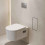 Wnęka ścienna z koszem na śmieci i drzwiczkami do wyłożenia płytkami 300/150/140 Stal XtraStoris Rock Hansgrohe (56063800)