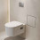 Wnęka ścienna z koszem na śmieci i drzwiczkami do wyłożenia płytkami 300/300/100 Stal XtraStoris Rock Hansgrohe (56089800)